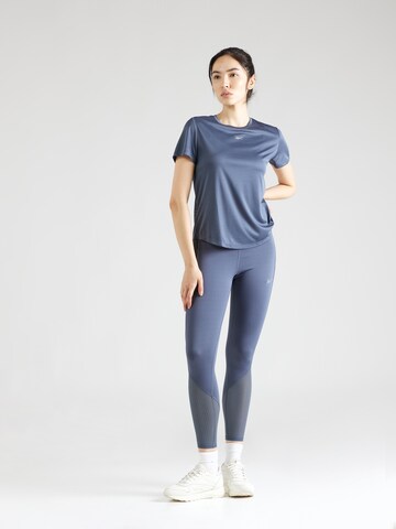 Reebok Skinny Sportovní kalhoty 'VECTOR' – modrá