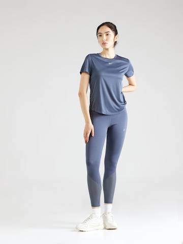 Reebok - Skinny Calças de desporto 'VECTOR' em azul