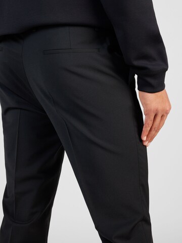 HUGO Slim fit Trousers with creases 'Hesten' in Black