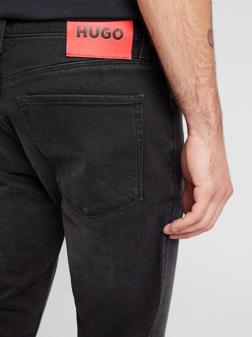 Slimfit Jeans '734' di HUGO in nero
