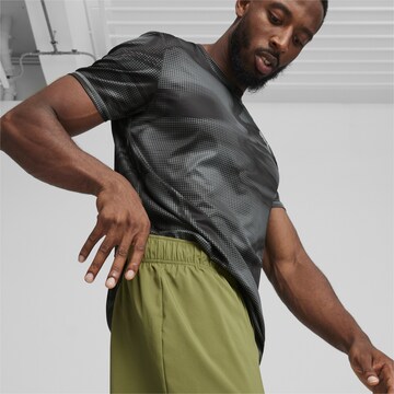 PUMA Regular Workout Pants 'Favourite' in Green