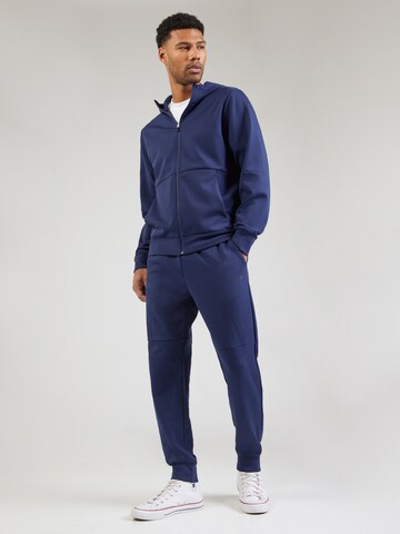 Costum de trening de la Champion Authentic Athletic Apparel pe albastru: față