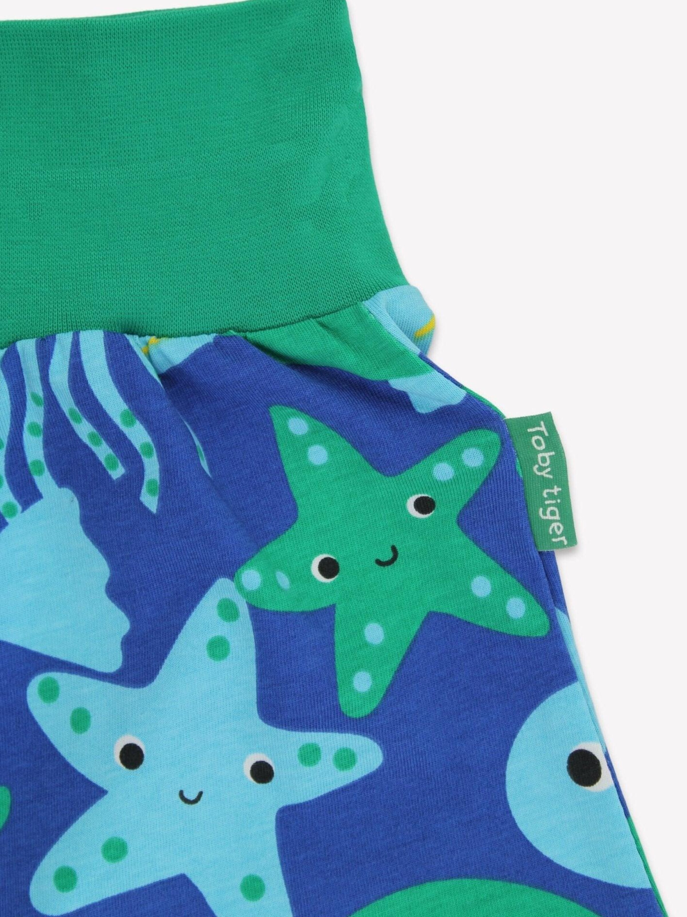 Toby Tiger Regular Pants 'Bio-Baumwoll Kinder Schlupfhose mit Fisch-Druck' in Green