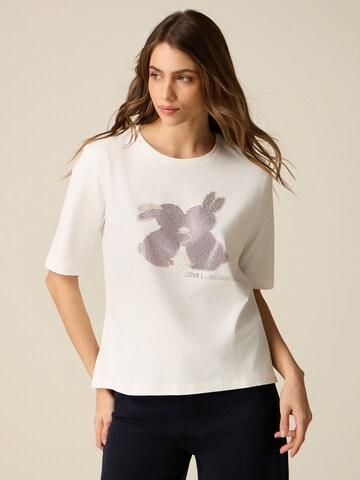 Top di oltre in bianco