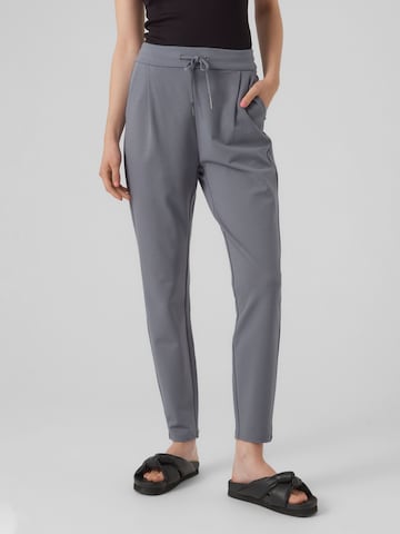 VERO MODA Tapered Pleat-Front Pants 'Eva' in Grey: front
