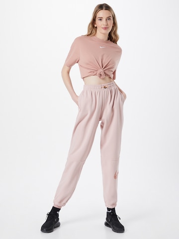 Nike Sportswear Tapered Trousers in Pink