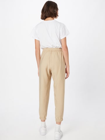 Karo Kauer - Tapered Pantalón 'Mercy' en beige