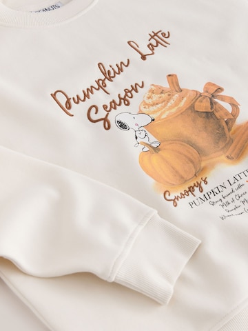 Sweat-shirt 'Pumpkin Latte Snoopy Licence' Next en beige