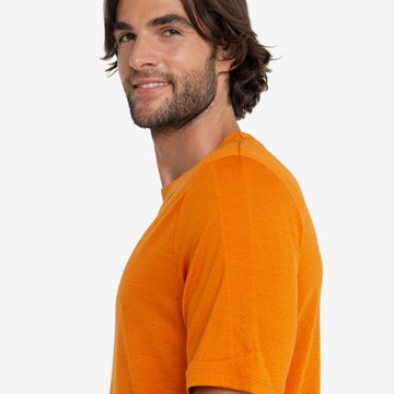 ICEBREAKER - Camisa funcionais 'ZoneKnit' em laranja