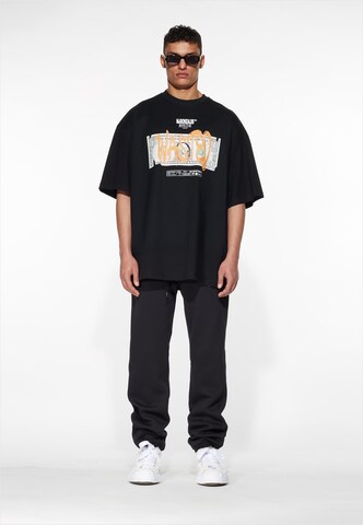 MJ Gonzales T-Shirt 'Dollar x Huge' in Schwarz