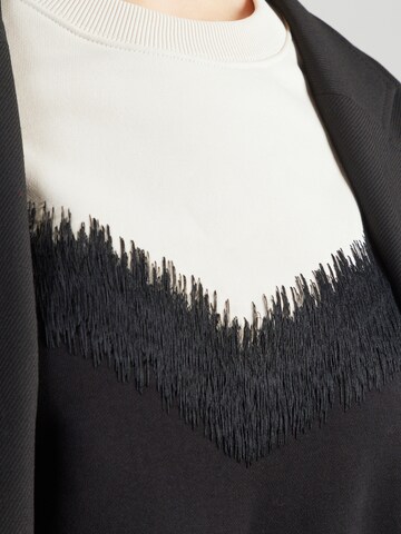 Bluză de molton 'JANEA_P1 10' de la DRYKORN pe negru