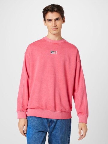 Tommy Jeans Sweatshirt 'Skater Timeless' in Pink: front