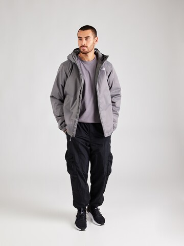THE NORTH FACE Regular fit Kültéri kabátok 'Quest' - szürke