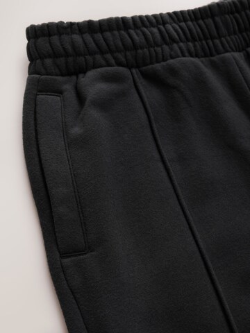 self. Wide Leg Hose in Schwarz