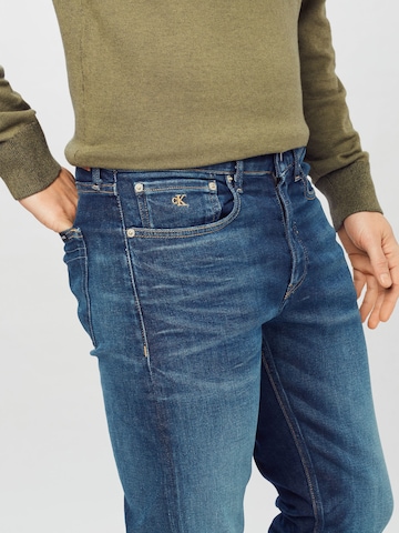 Calvin Klein JeansSlimfit Traperice - plava boja