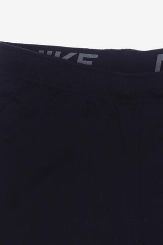 NIKE Shorts 34 in Schwarz