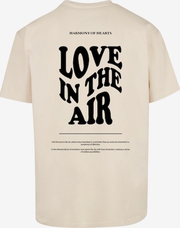 Merchcode T-Shirt 'Love In The Air' in Beige