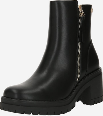 Xti Ankle Boots in Black: front