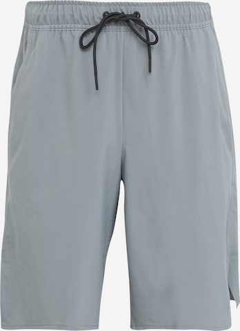 NIKE Regular Sports trousers in Grey: front