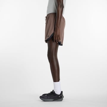 new balance Loosefit Sportbroek 'Essential' in Bruin