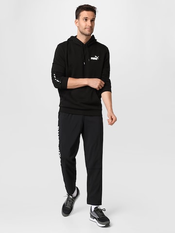 PUMA Athletic Sweatshirt 'Ess+' in Black