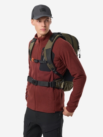 SWEDEMOUNT Urheilureppu 'Adventure 40L' värissä vihreä