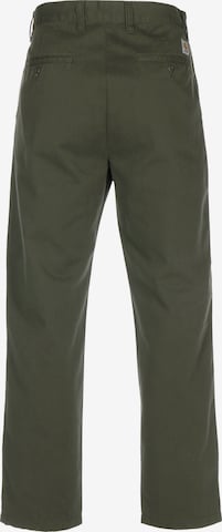 Carhartt WIP - Loosefit Calças chino 'Calder' em verde