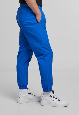 Loosefit Pantaloni sportivi di Karl Kani in blu