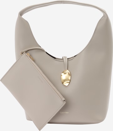 Sac bandoulière Calvin Klein en beige : devant