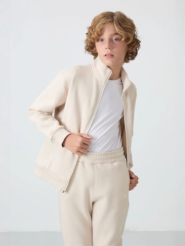 Tommy Life Trainingsanzug 'TOMMY Kinder Active Set'‌‌‌ in Beige