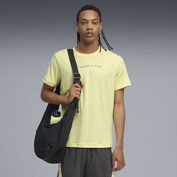 PUMA Performance shirt 'Run Club' in Yellow