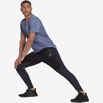 ADIDAS SPORTSWEAR Tapered Sportbroek 'Supernova' in Blauw