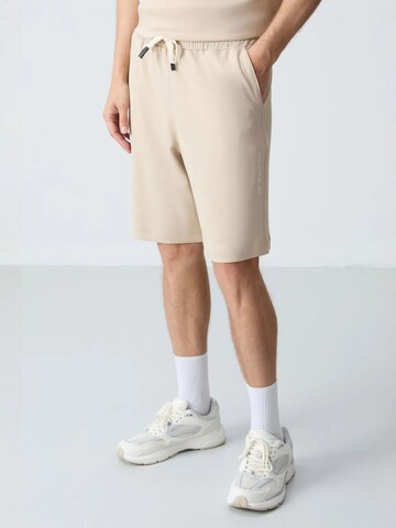 Tuta da jogging di Tommy Life in beige