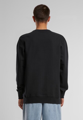 MT Men Sweatshirt 'Feel the Heat' in Black