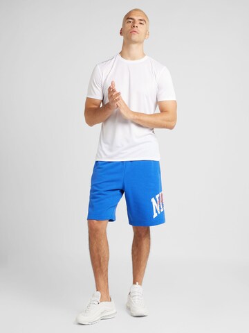 Nike Sportswear Loosefit Kalhoty 'CLUB' – modrá