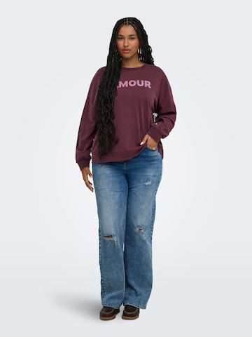Sweat-shirt 'CAREmelie' ONLY Carmakoma en rouge