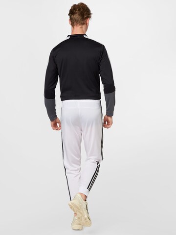 ADIDAS SPORTSWEAR Tapered Sportbroek 'Essentials Warm-Up' in Wit