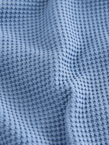 Set Next en bleu