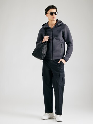 Giacca di felpa 'TCH FLC' di Nike Sportswear in grigio