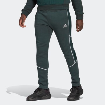 ADIDAS SPORTSWEAR Regular Urheiluhousut 'Essentials Reflect-In-The-Dark Fleece' värissä vihreä: edessä