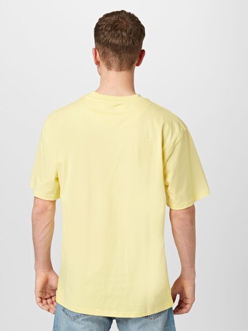 Karl Kani Koszulka w kolorze żółty
