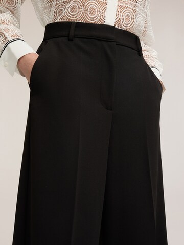 Wide leg Pantaloni di MOTIVI in nero