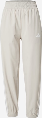 Pantalon de sport 'Train Essentials 3-Stripes Woven' ADIDAS PERFORMANCE en beige : devant