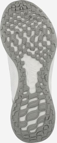 NIKE - Zapatillas de running 'Revolution 6' en gris