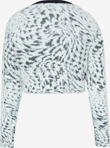 Cardigan swirly en blanc