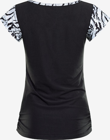 Winshape Toiminnallinen paita 'AET109LS' värissä musta