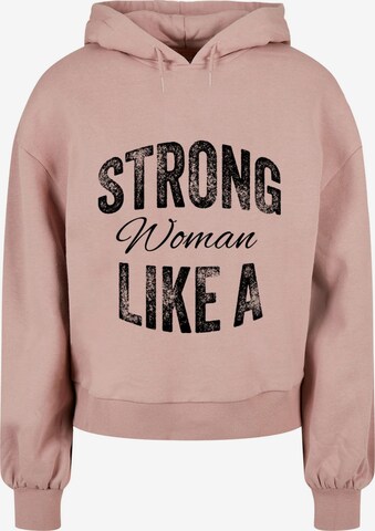 Merchcode Sweatshirt 'WD - Strong Like A Woman' in Pink: predná strana