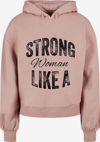 Merchcode Sweatshirt 'WD - Strong Like A Woman' in Roze: voorkant