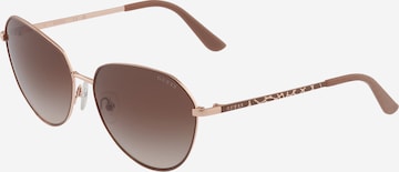 Ochelari de soare de la GUESS pe bej: față
