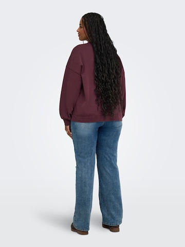 Sweat-shirt 'CAREmelie' ONLY Carmakoma en rouge